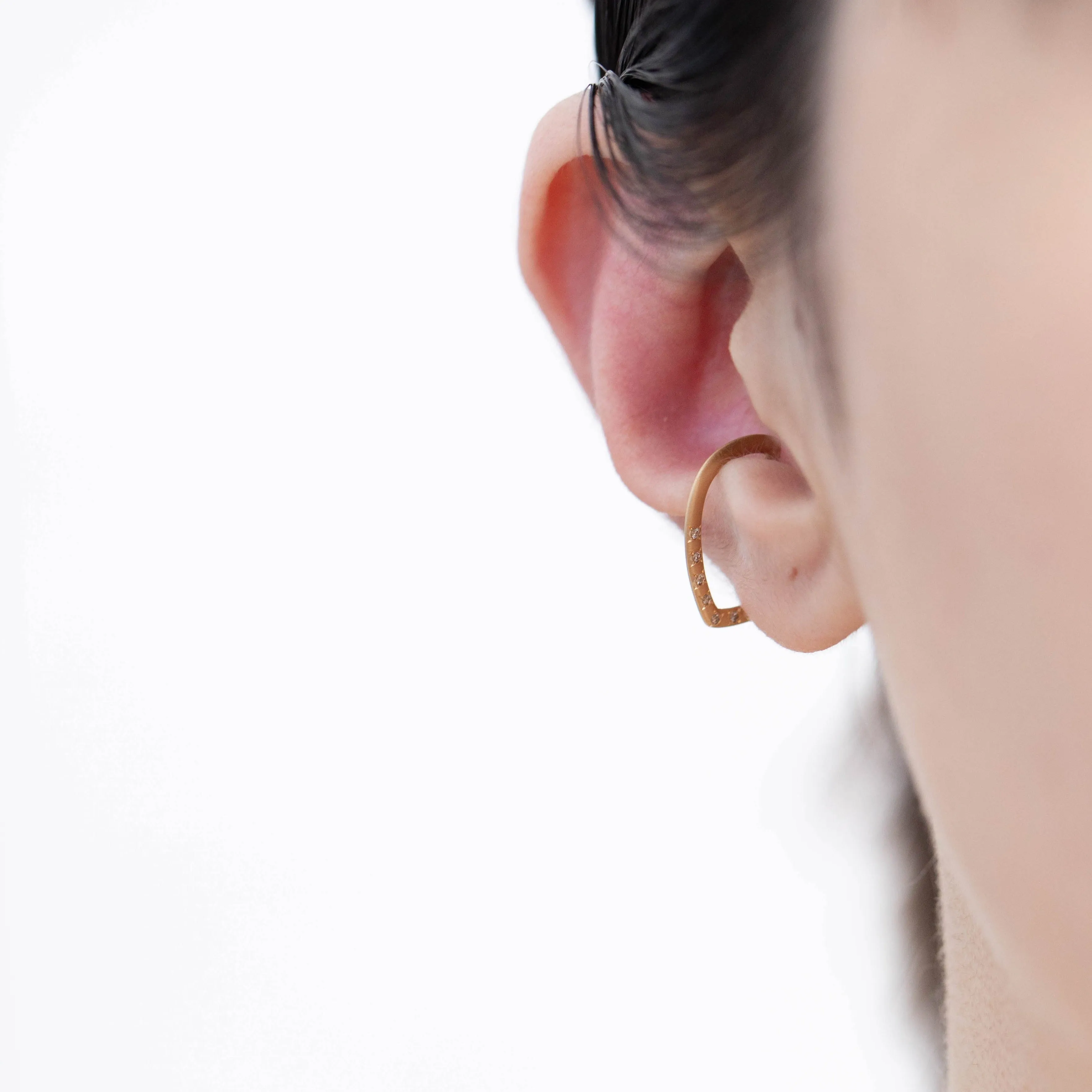 Crest spear ear cuff with diamonds