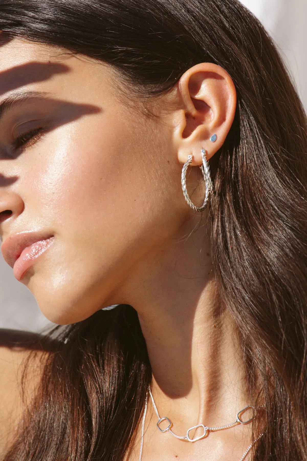 Medium twisted hoop earring silver 30mm